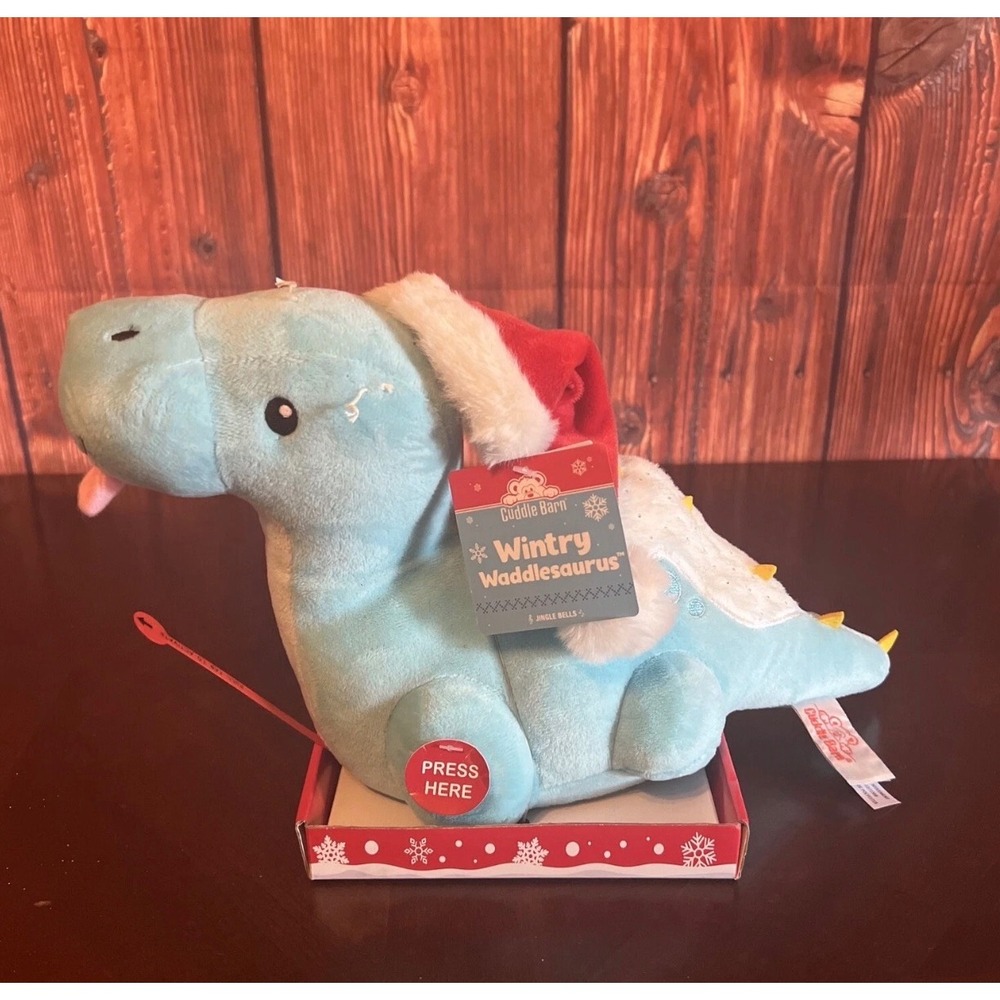 Cuddle Barn Wintry Waddlesaurus Animated Musical Christmas Dinosaur Plush Toy